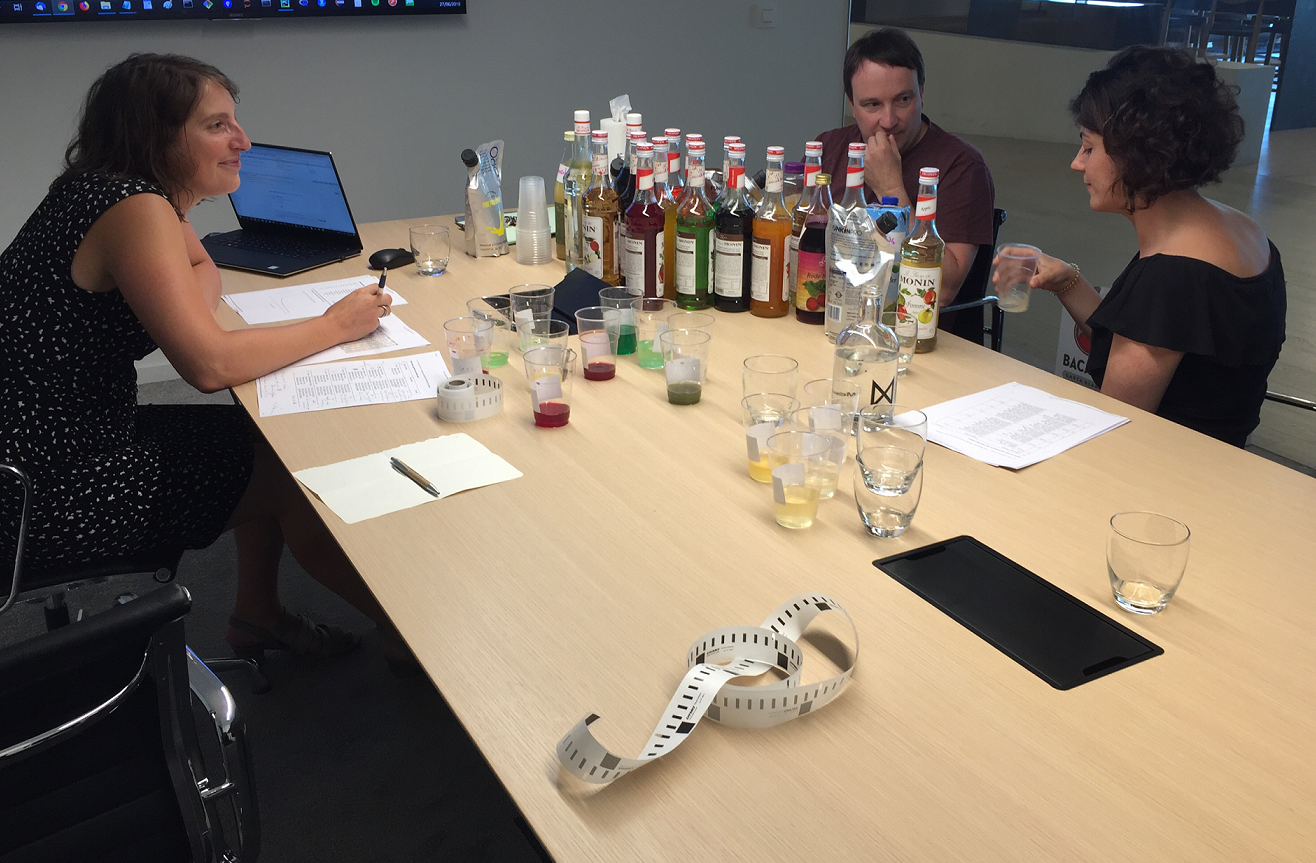 Picture of Sofie and colleagues testing cocktail recipes
